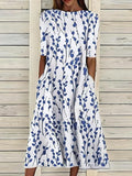 Selma – Vestido midi estampado con bajo de volante