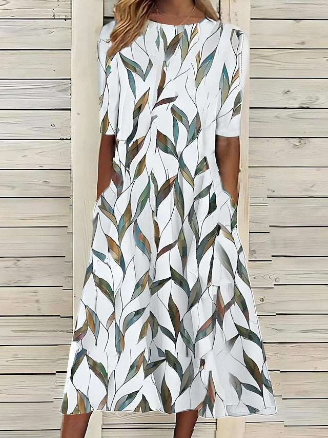 Selma – Vestido midi estampado con bajo de volante