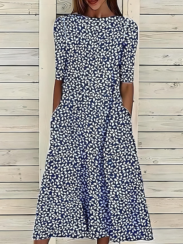 Selma – Vestido midi estampado con bajo de volante